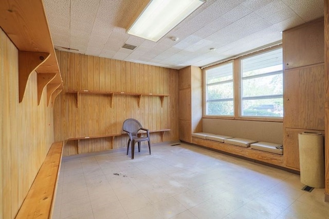 1614 N Patterson St, Valdosta, GA 31602 - interior space featuring wooden walls and light floors