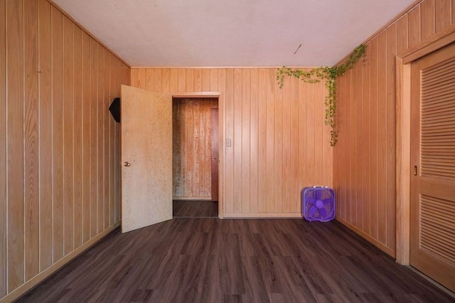 1614 N Patterson St, Valdosta, GA 31602 - empty room featuring wood walls and wood finished floors