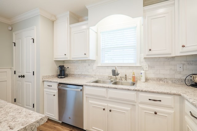 4137 Nelson Hill Pl, Hahira, GA 31632 - kitchen with stainless steel dishwasher, backsplash, crown molding, white cabinets, and light wood finished floors