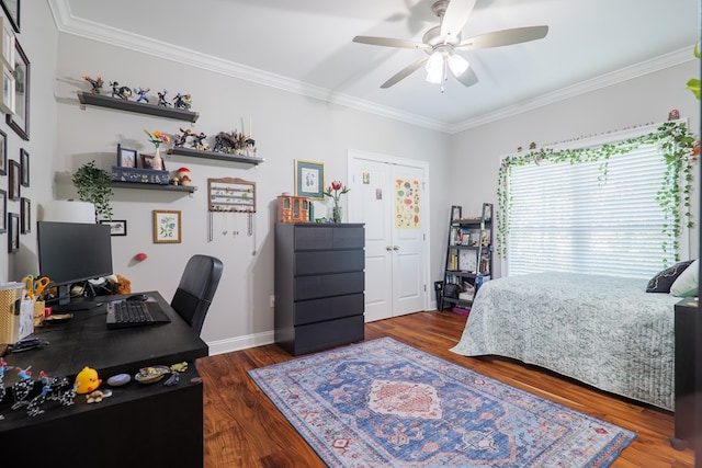 bedroom with ornamental molding, ceiling fan, and dark wood-type flooring