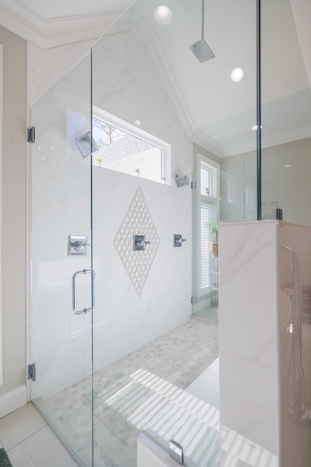 bathroom with tile patterned flooring, lofted ceiling, an enclosed shower, and crown molding