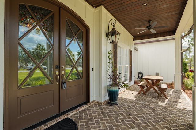 property entrance with ceiling fan and french doors