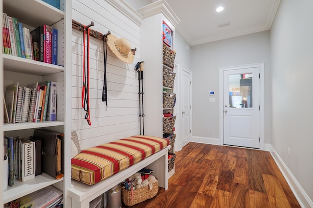 mudroom featuring crown molding and dark hardwood / wood-style floors