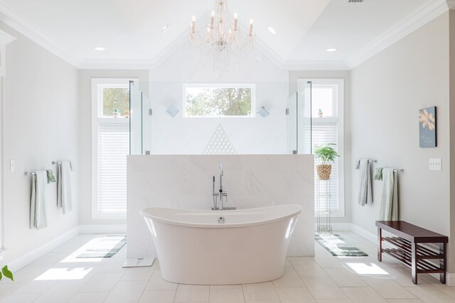 bathroom with tile patterned floors, crown molding, and a wealth of natural light