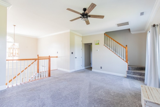 carpeted empty room with crown molding and ceiling fan with notable chandelier