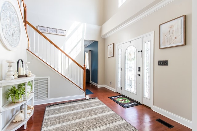 foyer featuring dark wood-type flooring