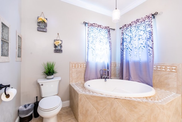 bathroom featuring tile patterned flooring, toilet, ornamental molding, and tiled tub