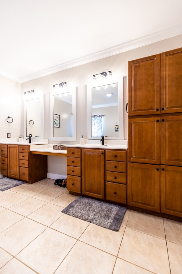 bathroom with vanity, tile patterned floors, and crown molding