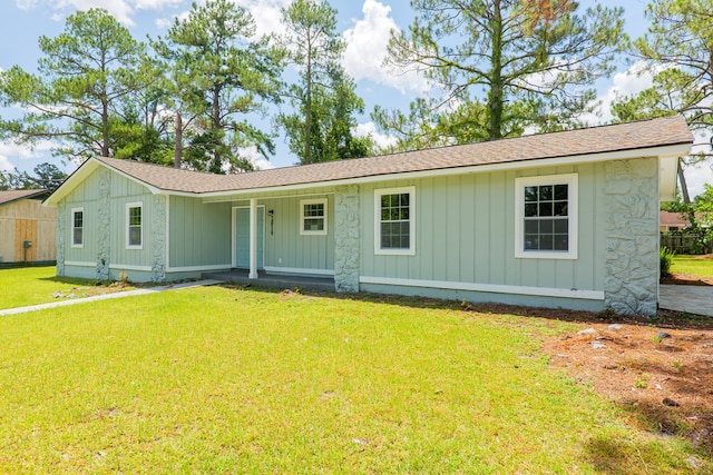 2019 Falling Leaf Ln, Valdosta, GA 31602 - ranch-style home with board and batten siding, a front lawn, a porch, and a shingled roof