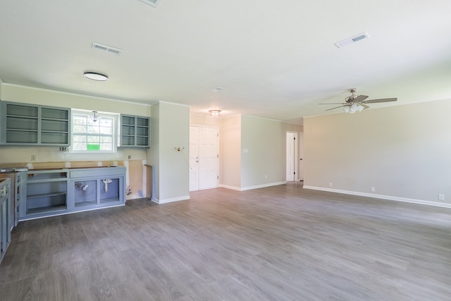 2019 Falling Leaf Ln, Valdosta, GA 31602 - unfurnished living room with a ceiling fan and wood finished floors