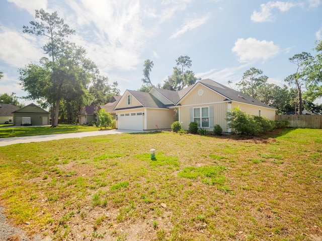 5674 Clydetta Dr, Lake Park, GA 31636 - ranch-style house with concrete driveway and an attached garage