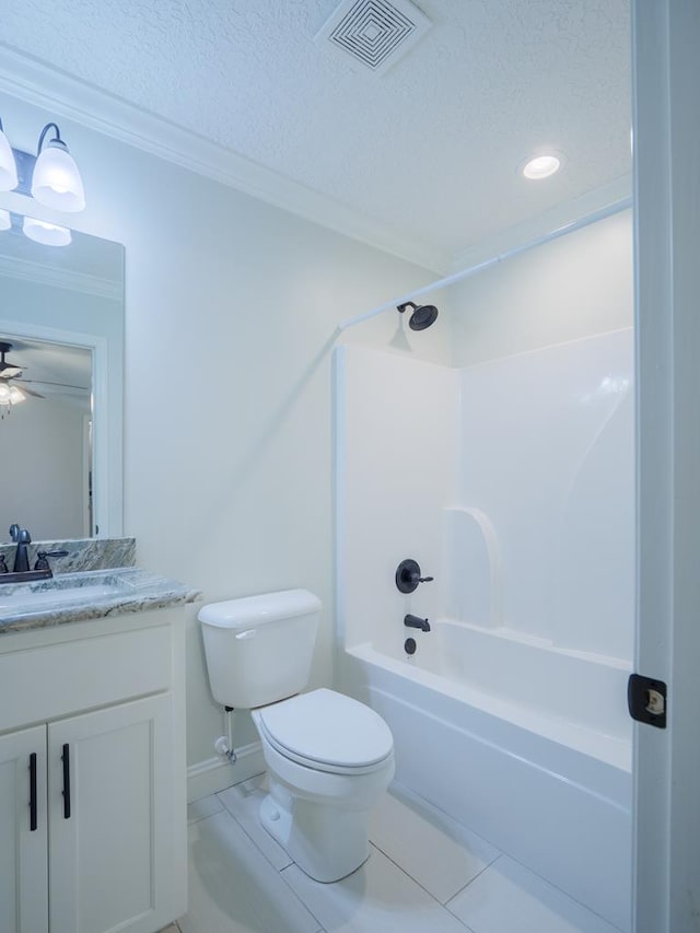 5674 Clydetta Dr, Lake Park, GA 31636 - bathroom featuring toilet, vanity, washtub / shower combination, tile patterned flooring, and crown molding