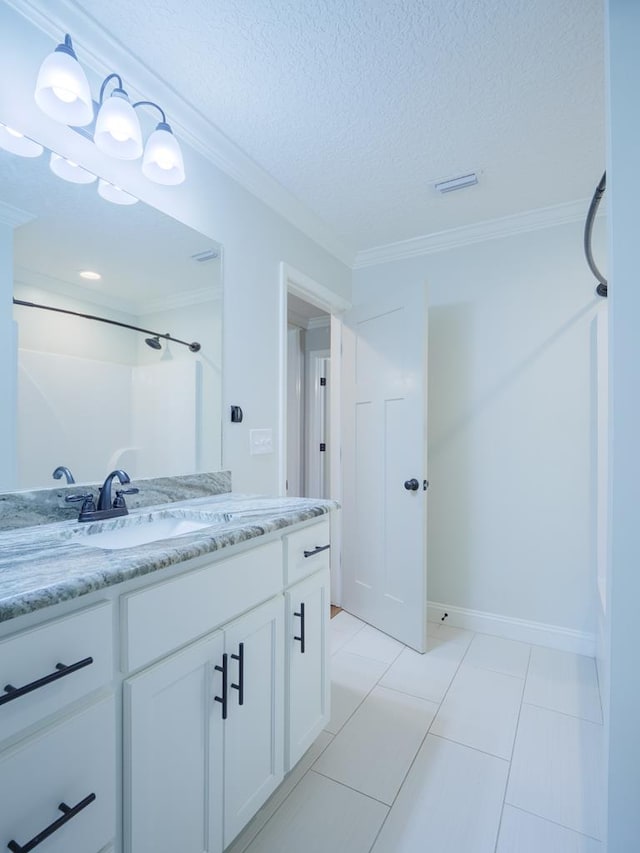 5674 Clydetta Dr, Lake Park, GA 31636 - full bath featuring vanity, ornamental molding, a shower, a textured ceiling, and baseboards