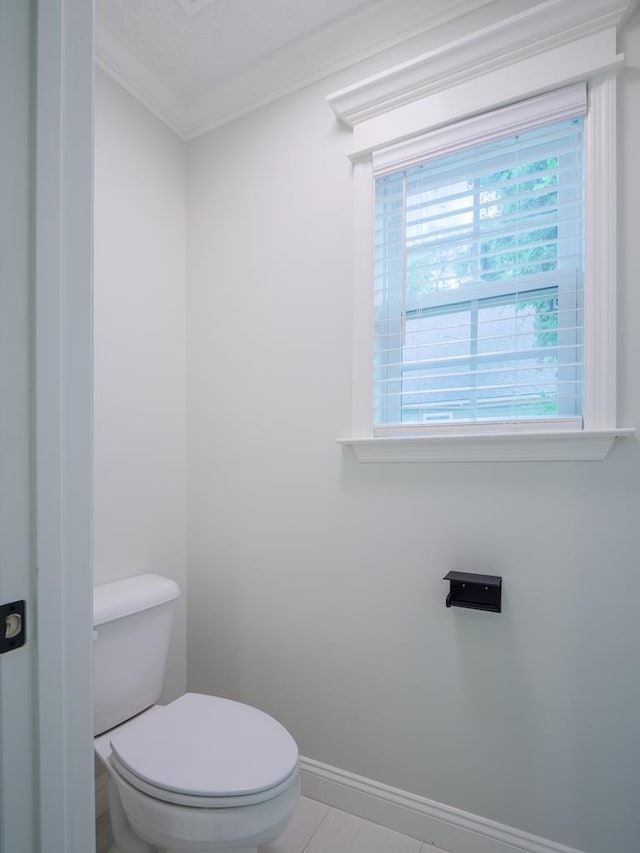 5674 Clydetta Dr, Lake Park, GA 31636 - bathroom featuring toilet, baseboards, and crown molding