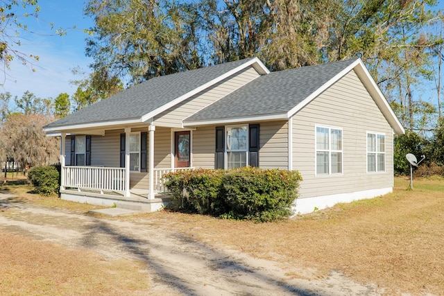 view of front of property featuring covered porch