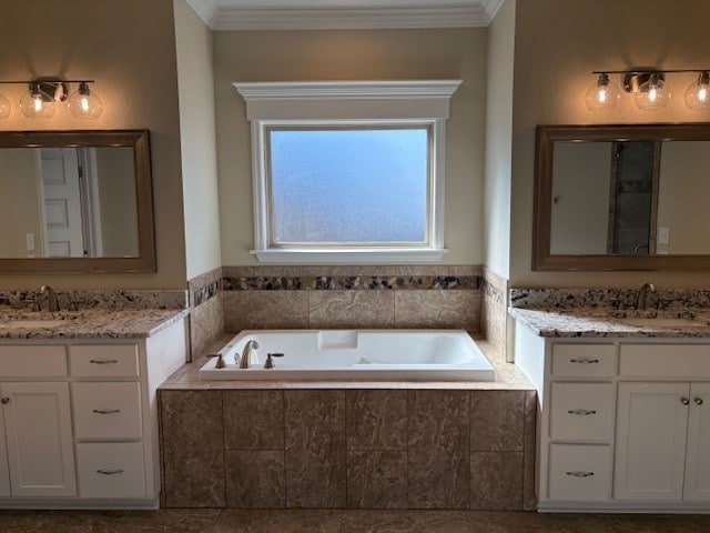 bathroom with crown molding, vanity, and shower with separate bathtub