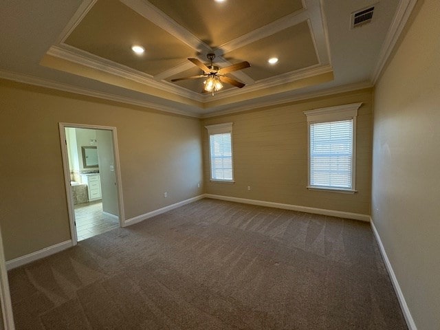 empty room with coffered ceiling, ornamental molding, carpet flooring, beamed ceiling, and ceiling fan