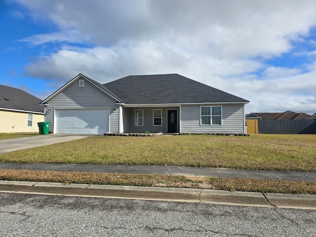 single story home featuring a front lawn and a garage