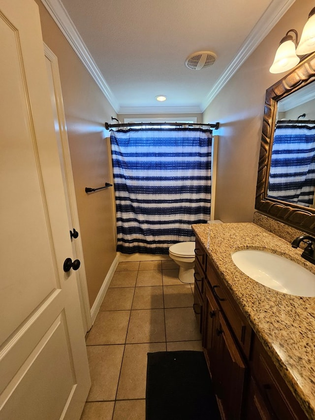 bathroom featuring tile patterned flooring, vanity, toilet, and ornamental molding