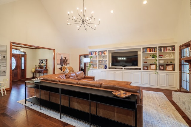 living room featuring high vaulted ceiling, a chandelier, and dark hardwood / wood-style flooring