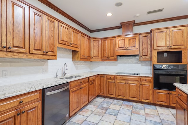 4849 Oak Arbor Dr, Valdosta, GA 31602 - kitchen with black appliances, crown molding, brown cabinetry, backsplash, and light stone countertops