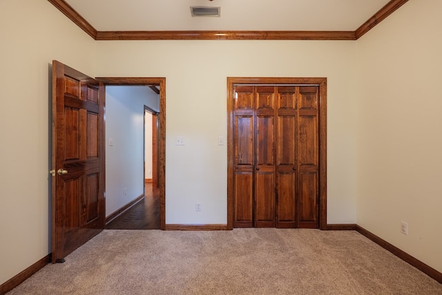 4849 Oak Arbor Dr, Valdosta, GA 31602 - unfurnished bedroom with crown molding and carpet