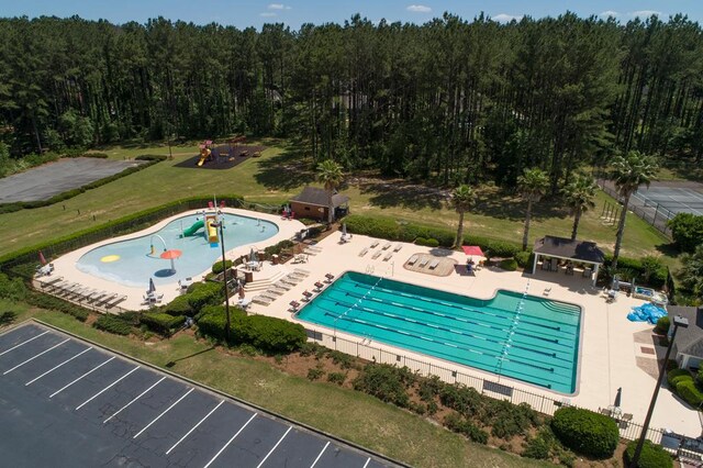 4849 Oak Arbor Dr, Valdosta, GA 31602 - bird's eye view of a pool and a heavily wooded area