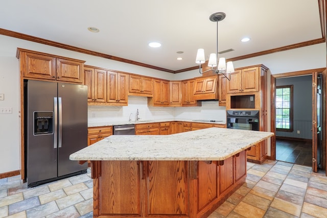 4849 Oak Arbor Dr, Valdosta, GA 31602 - kitchen with black appliances, stone tile floors, a chandelier, brown cabinetry, and crown molding
