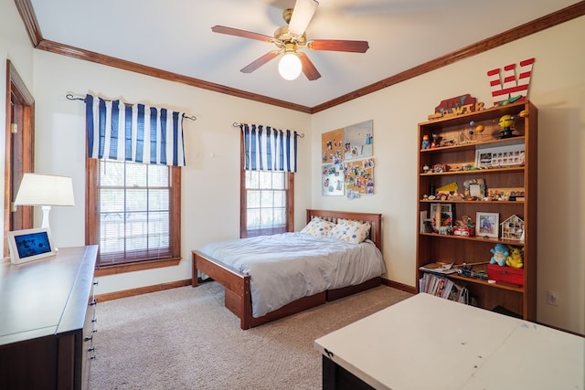 bedroom featuring ornamental molding, light carpet, and ceiling fan