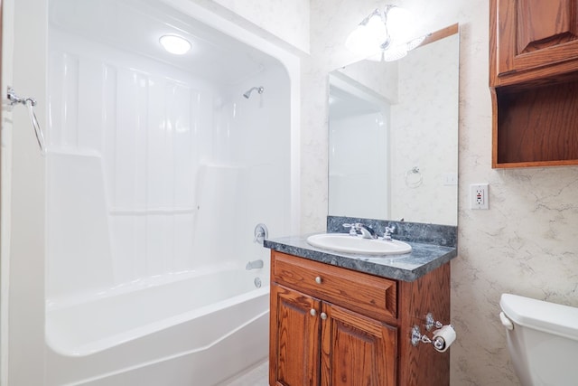 full bathroom with vanity, shower / bathtub combination, and toilet