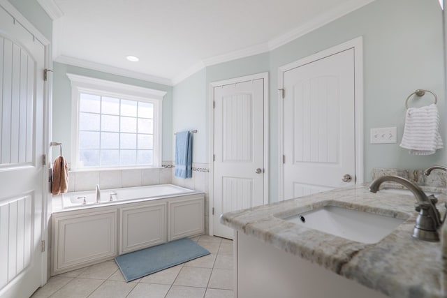 bathroom featuring tile patterned flooring, a bath, and ornamental molding