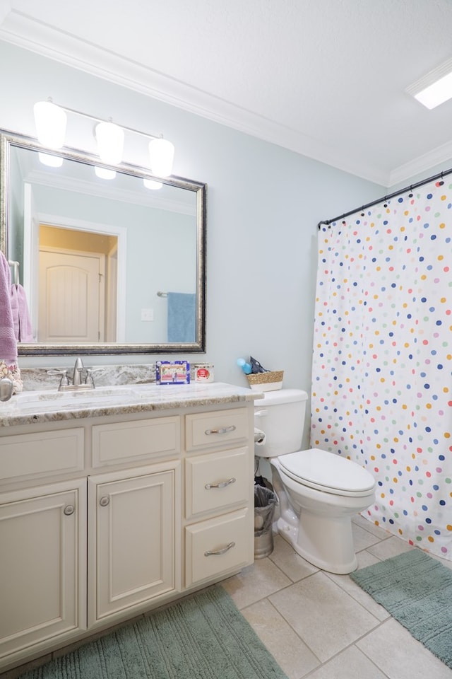 bathroom featuring tile patterned flooring, ornamental molding, toilet, vanity, and a shower with shower curtain