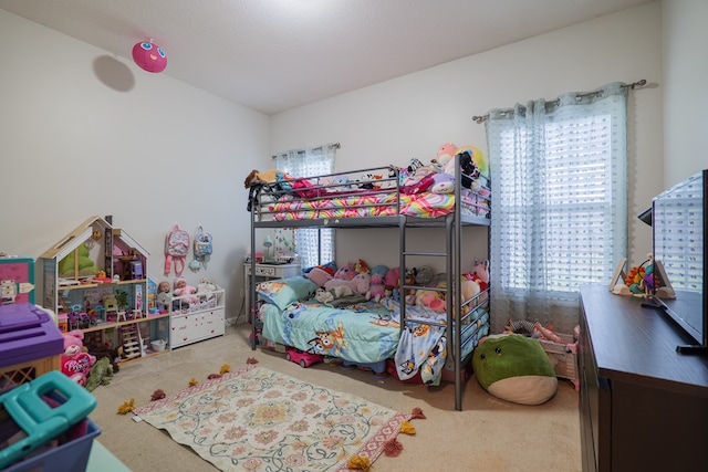 bedroom featuring carpet flooring