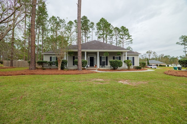 view of front of house featuring a porch and a front yard