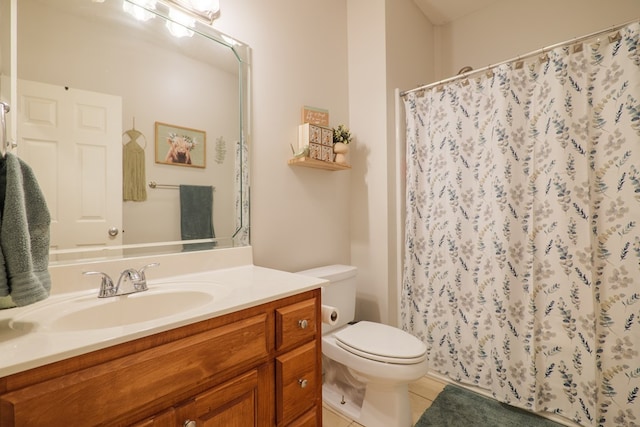 bathroom featuring tile patterned floors, a shower with curtain, vanity, and toilet