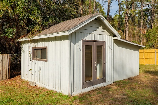 view of shed with fence