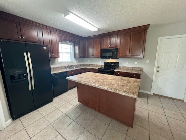 3664 Druid Oaks Dr, Valdosta, GA 31602 - kitchen featuring a textured ceiling, black appliances, light tile patterned flooring, and light countertops