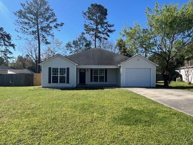 3664 Druid Oaks Dr, Valdosta, GA 31602 - ranch-style home featuring driveway, a front yard, a garage, and fence