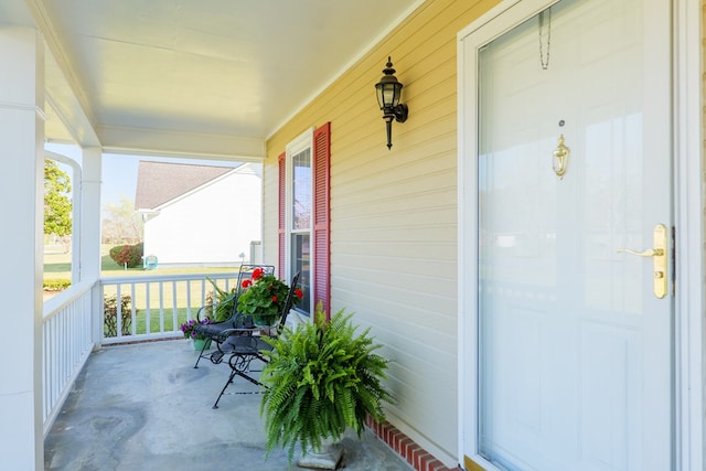 balcony featuring a porch