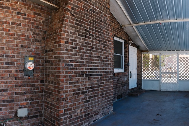 view of home's exterior featuring crawl space and brick siding