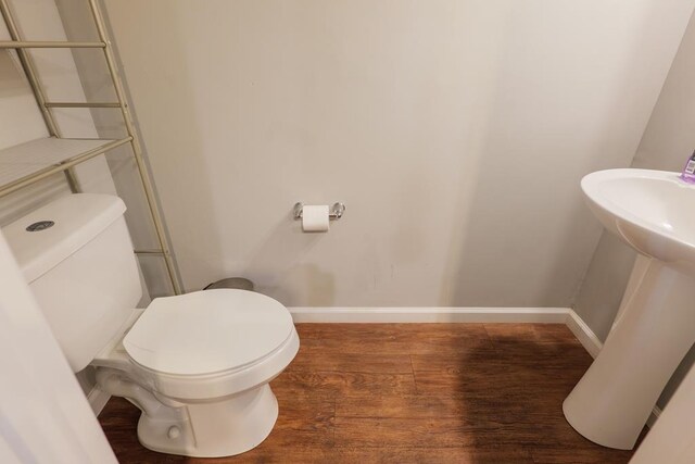 610 Baytree Rd Unit 35, Valdosta, GA 31602 - bathroom with wood finished floors, baseboards, and toilet