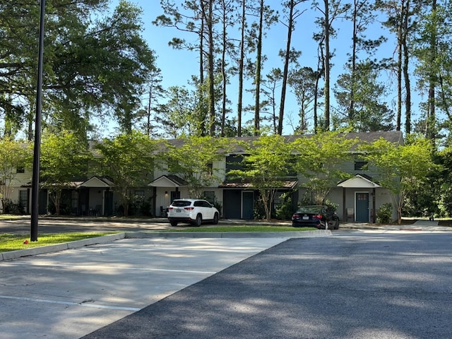 view of front of home featuring uncovered parking