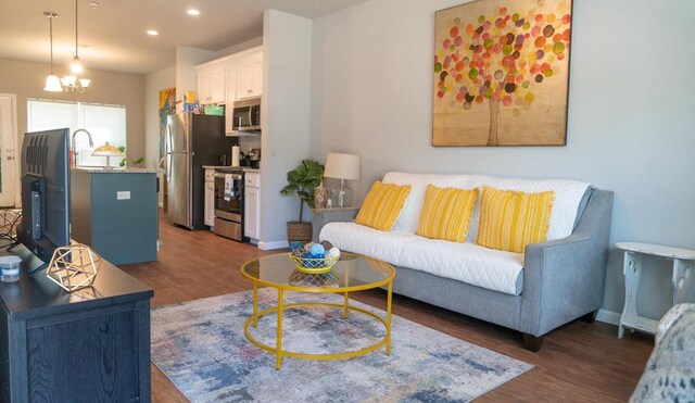 610 Baytree Rd Unit 35, Valdosta, GA 31602 - living area featuring wood finished floors, recessed lighting, baseboards, and a chandelier