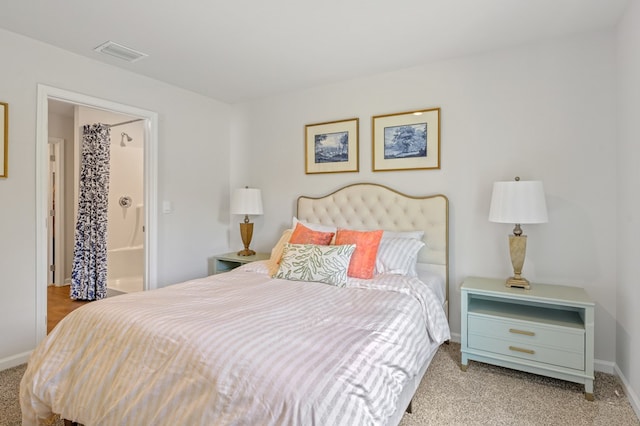 bedroom with carpet, visible vents, and baseboards