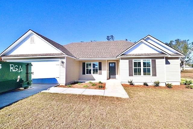 single story home with a garage and a front lawn