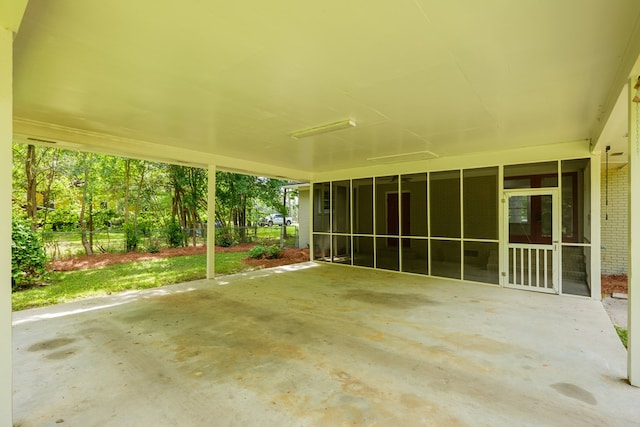 view of patio / terrace with a sunroom