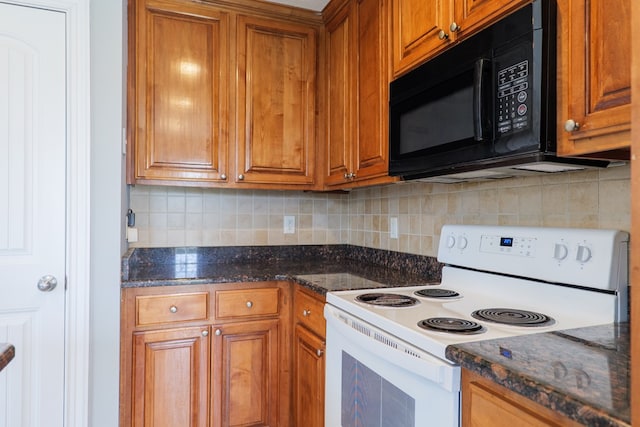 kitchen with black microwave, white electric range, backsplash, and brown cabinets