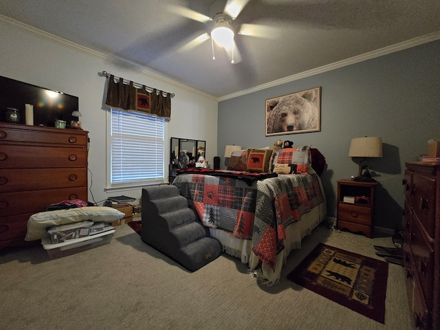 bedroom featuring ornamental molding, ceiling fan, and carpet