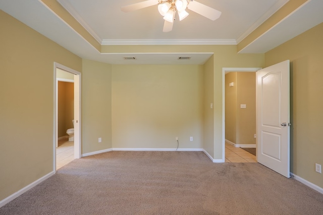 5702 Emily Ln, Hahira, GA 31632 - spare room with light colored carpet, crown molding, a ceiling fan, and baseboards