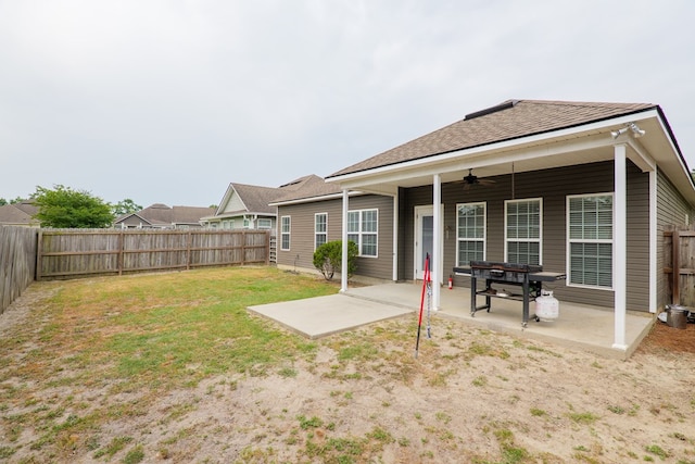 3960 Newbury Dr, Valdosta, GA 31605 - rear view of house featuring a ceiling fan, a patio, and roof with shingles